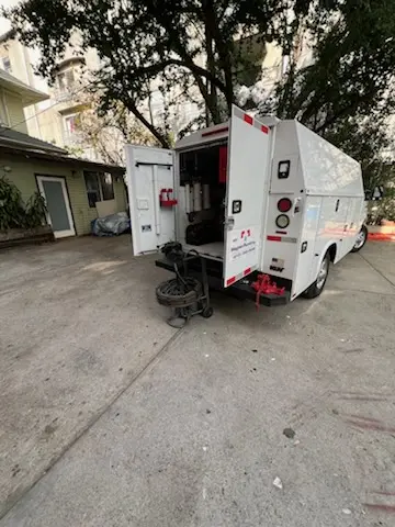 Magnet Plumbing service vehicle on-site for Grease Trap Cleaning in Canyon Crest